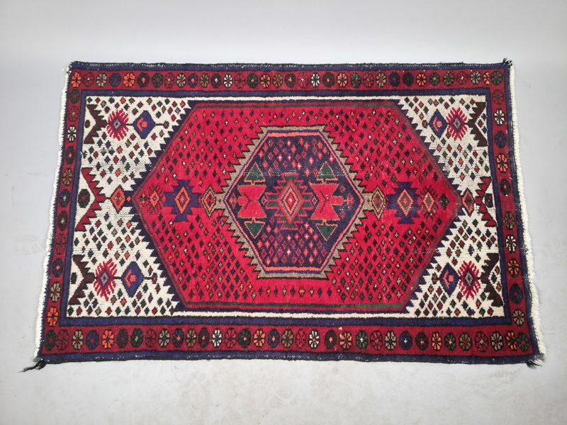 Orientalisk matta, handknuten