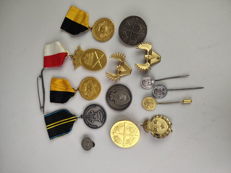 Silvermedaljer & pins