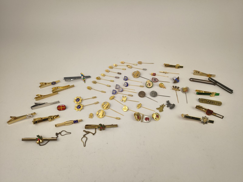 Pins, sliphållare m.fl.
