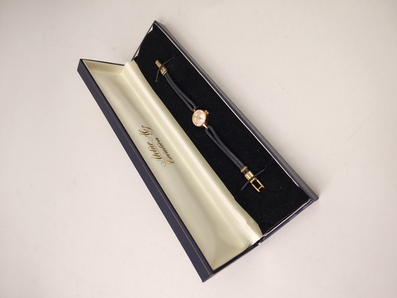 Damur, Tissot 14k Guld