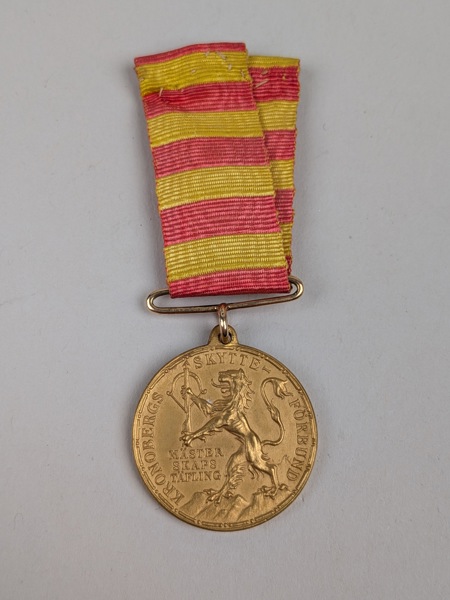  Guldmedalj, 18 k "Kronobergs Skytte-förbund" Guld 1936