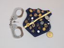 Pins & handfängsel