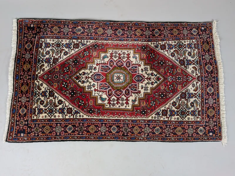 Orientalisk matta, handknuten
