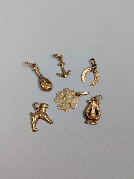 Berlocker, 18 k Guld