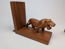 Bokstöd, teak Lejonskulpturer