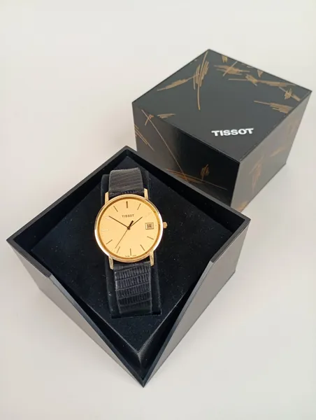 Armbandsur herr, 18 k Guld Tissot quartz