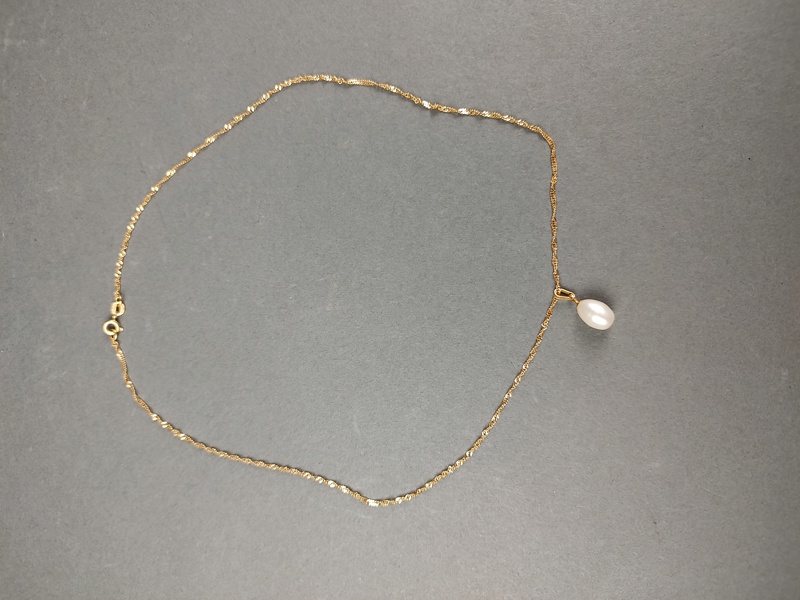 Halsband men pärla, 18 k guld