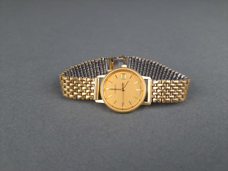 Armbandsur, dam Tissot 18 k guld